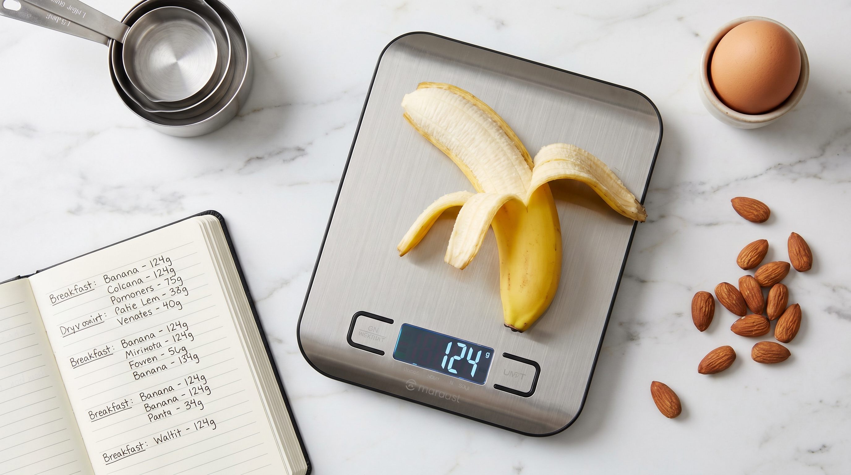 A digital food scale with a portioned meal, showing accurate portion measurement for calorie tracking